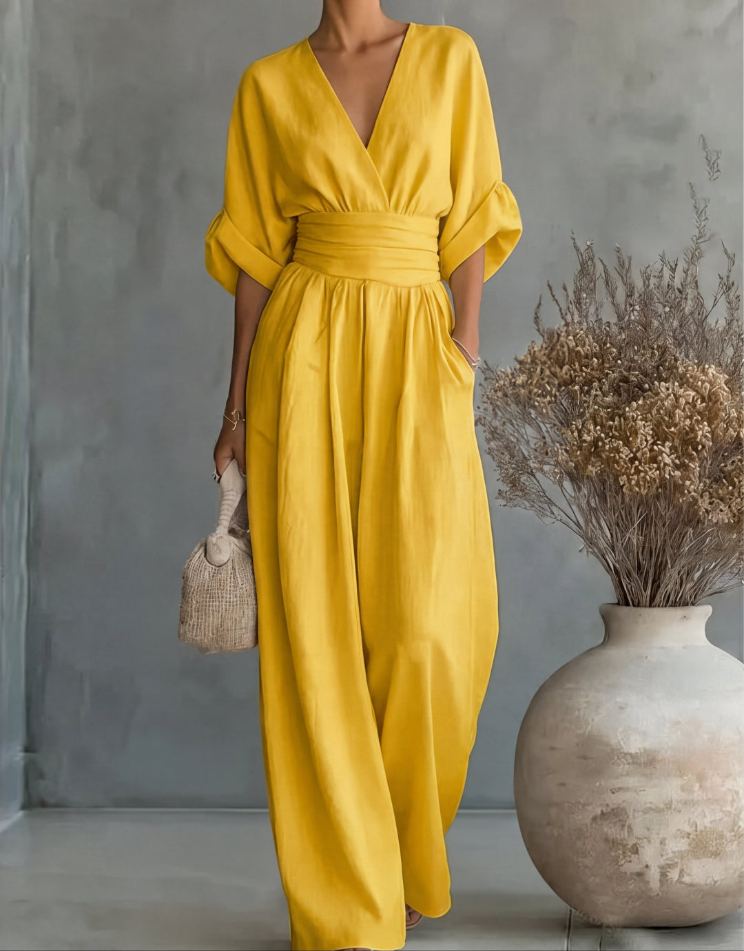 Daniela – Tuta elegante con scollo a V e pantaloni a gamba larga