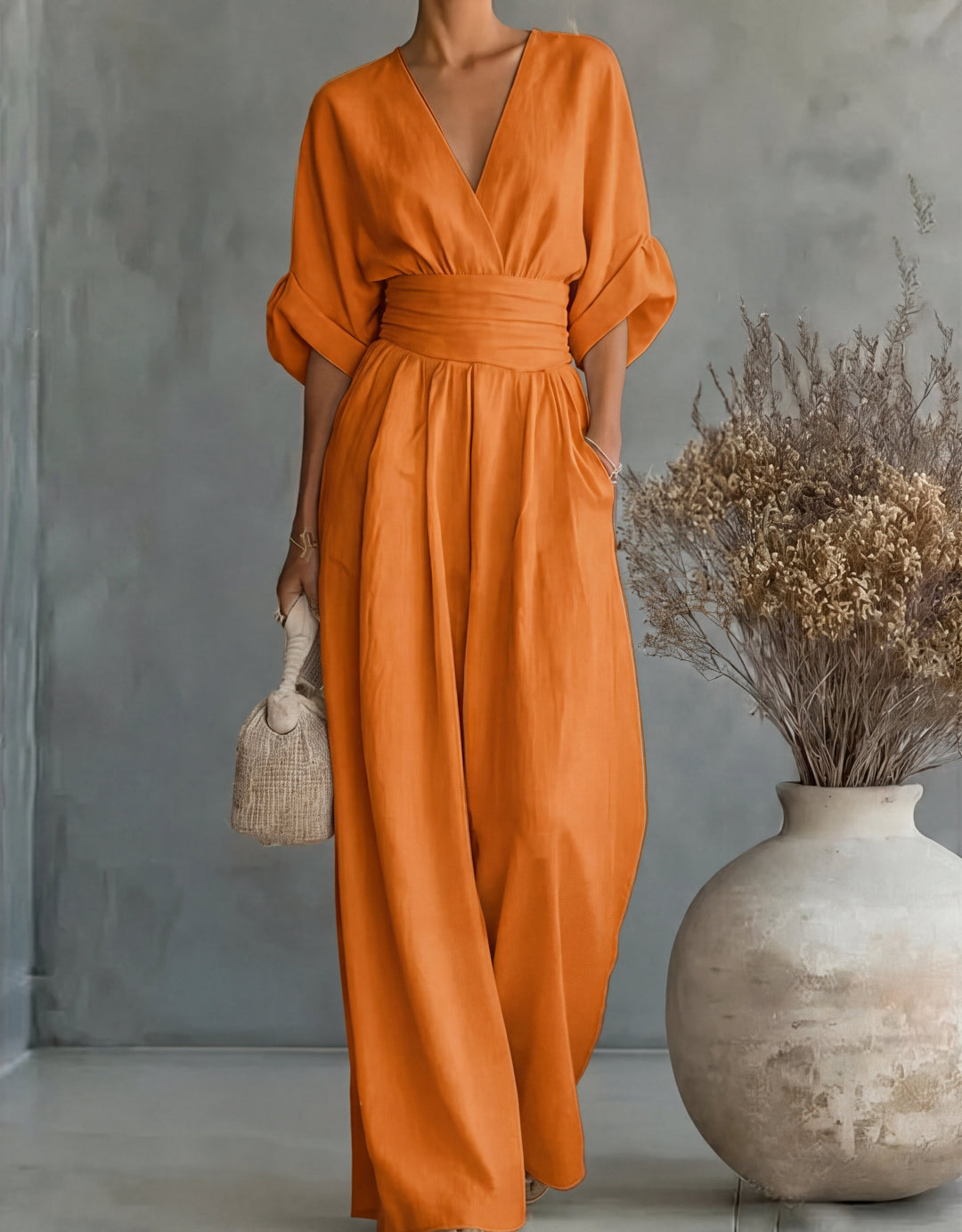 Daniela – Tuta elegante con scollo a V e pantaloni a gamba larga