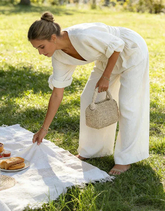 Daniela – Tuta elegante con scollo a V e pantaloni a gamba larga
